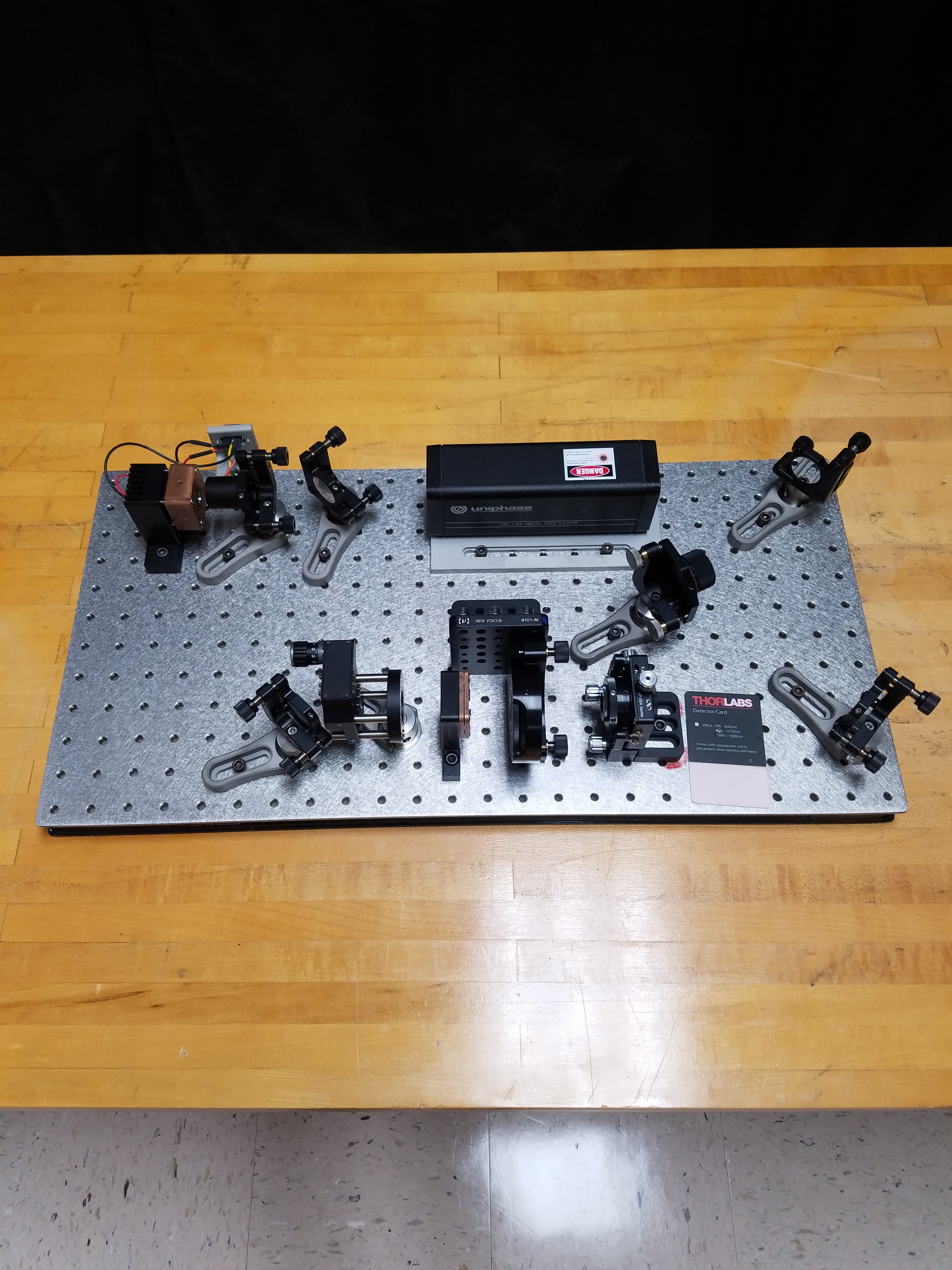 attachment:Breadboard with Optics.jpeg